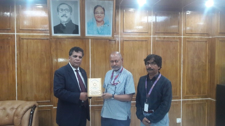 Receiving crest after the session from the vice chancellor of Begum Rokeya University